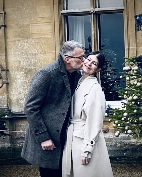 Julie Feyerer, Legendary Travel advisor, outside a country house at Christmas